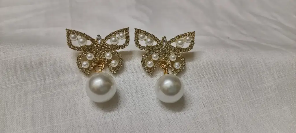 Butterfly AD stone earrings.