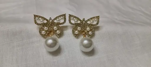 Butterfly AD stone earrings.